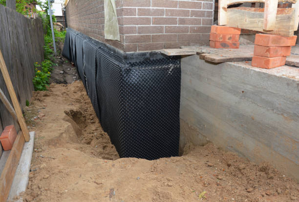 Happy homeowners after waterproofing job in North Ridgeville